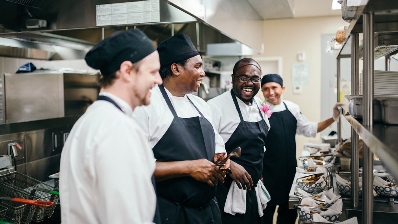 A Compass Group kitchen team on shift